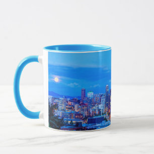Super Moon rising near Seattle skyline Mug