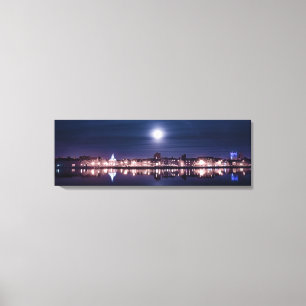 Super moon rising over Kings Lynn's night harbour Canvas Print