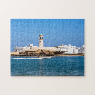 Sur Lighthouse with fisherman boat - Sur, Oman Jigsaw Puzzle
