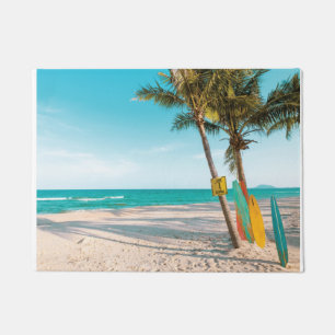 Surf boards on beach throw pillow doormat