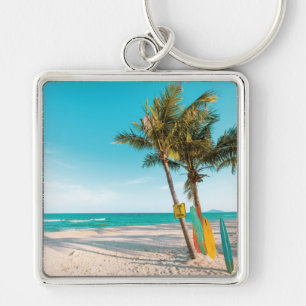 Surf boards on beach throw pillow keychain