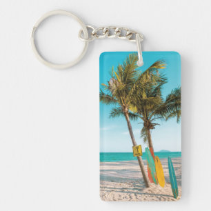 Surf boards on beach throw pillow keychain