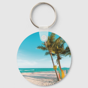 Surf boards on beach throw pillow keychain