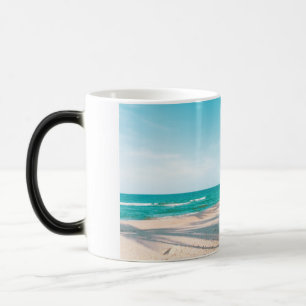 Surf boards on beach throw pillow magic mug