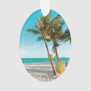 Surf boards on beach throw pillow ornament