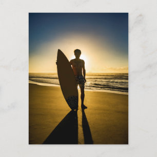 Surfer silhouette during sunrise postcard