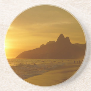 surfers at Sunset Coaster