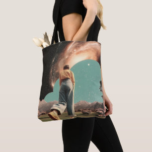 Surreal figure walking into galaxy gateway tote bag