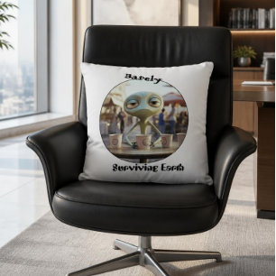 Surviving earth alien coffee drinker throw pillow