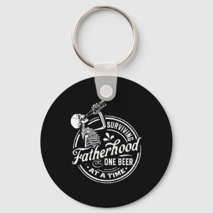 Surviving Fatherhood One Beer At A Time Funny Fath Keychain