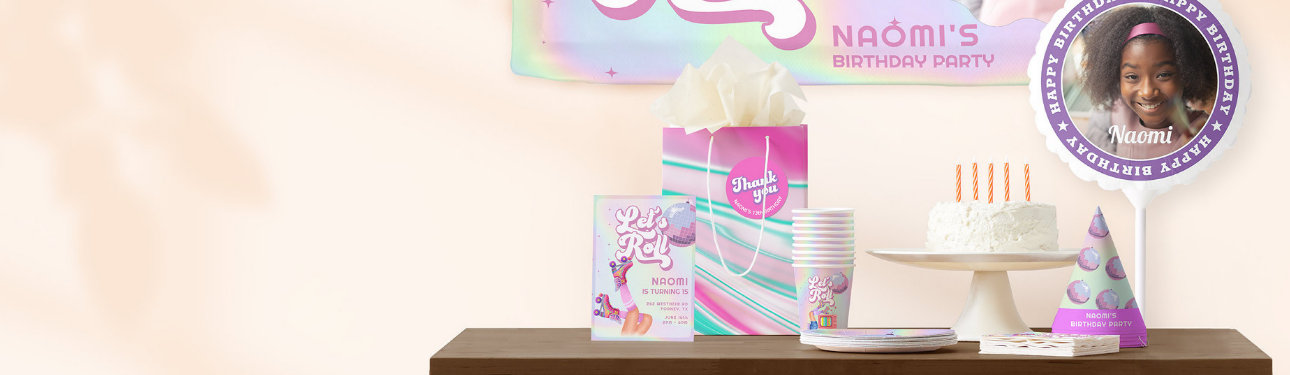 Roller skating-themed birthday setup with personalized decor for Naomi, featuring cake, cups, and signage.