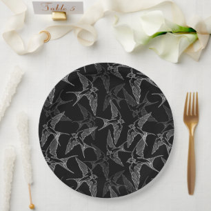 Swallows in flight. paper plate