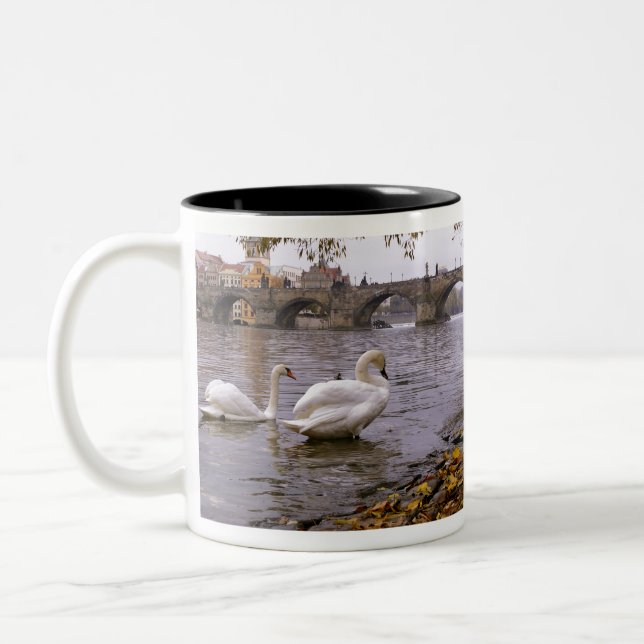 Swans and Charles bridge in Prague Two-Tone Coffee Mug (Left)