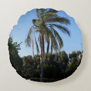Swaying Palm Tree Under a Clear Sky Round Pillow
