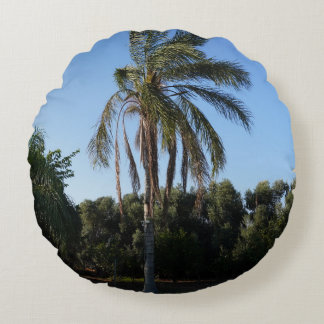 Swaying Palm Tree Under a Clear Sky Round Pillow