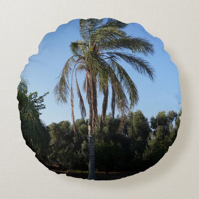 Swaying Palm Tree Under a Clear Sky Round Pillow (Front)