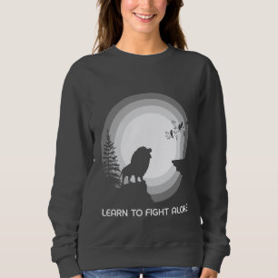 Sweatshirt Apprendre à se battre seul – Lion sous la lumière
