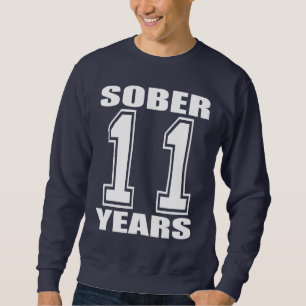 Sweatshirt Assagissez 11 ans de blanc sur l'obscurité