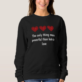 Sweatshirt La seule chose plus puissante que la haine est l'a
