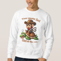 Singe cowboy mignon montant une tortue