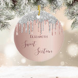 Sweet 16 birthday rose gold pink ceramic ornament<br><div class="desc">An ornament for a girly and glamourous Sweet 16th birthday. A faux rose gold background with an elegant rose gold and drips, paint dripping look. The text: Sweet Sixteen is written in dark rose gold with a large modern hand lettered style script. Personalize and add a name. Perfect as party...</div>