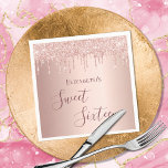 Sweet 16th sixteen birthday rose gold glitter napkin<br><div class="desc">A napkin for a girly and glamorous Sweet 16th birthday party. A faux rose gold metallic looking background with an elegant faux rose gold glitter drips, paint drip look. The text: Sweet Sixteen is written in dark rose gold with a large modern hand lettered style script. Tempate for a name....</div>