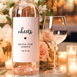 Sweet and Whimsical | Wedding Cheers Wine Label<br><div class="desc">These simple and stylish,  black and white wedding wine labels feature whimsical,  vintage style script typography that says "cheers, " along with a matching heart. An elegant,  classic minimalist look that is still unique and contemporary.</div>