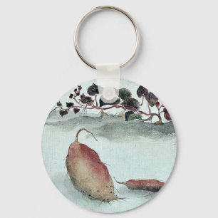 Sweet potato with plant growing in the background keychain