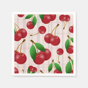 sweet red cherries on pastel plaid napkin