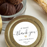Sweet Thank You Simple Script Bridal Shower Favou Classic Round Sticker<br><div class="desc">Add an elegant personalized touch to bridal shower party favours with "a sweet thank you" custom round stickers. All wording on this template is simple to customize for wedding gift tags or treat bag seals. The modern black and white design features a gold faux foil heart, chic trendy script calligraphy,...</div>