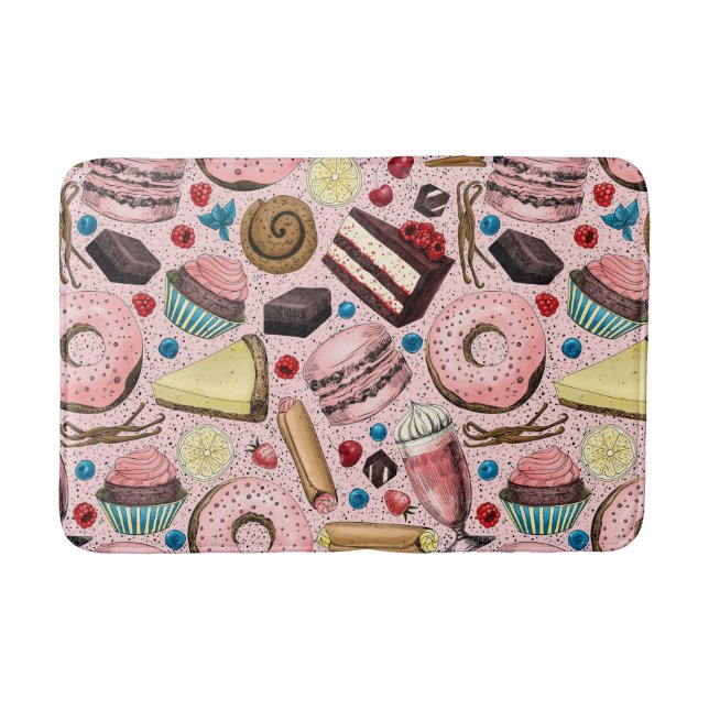 Sweet treats on pink bath mat (Front)