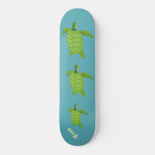 Swimming sea turtles and calligraphy on teal skateboard