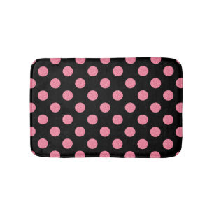 Swirly pink polka dots on black background bath mat