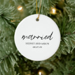 Sydney First Christmas Married Modern Ceramic Ornament<br><div class="desc">Modern Christmas ornament featuring a contemporary typographic design with "married" in elegant script typography along with your names and wedding date in a simple and minimal layout. The back has your favourite photo. The colour theme is black and white and may be changed the design editing tool. This minimalist style...</div>