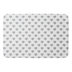 Symmetric Small Concrete Grey Hearts on White Bath Mat