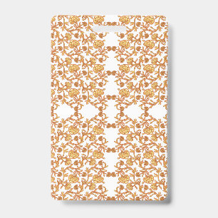 Symmetrical floral pattern with orange motifs rese badge