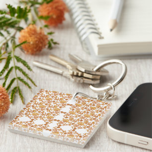 Symmetrical floral pattern with orange motifs rese keychain