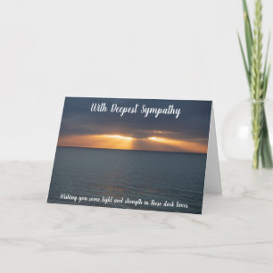 Sympathy sunset over the sea; light in dark times card