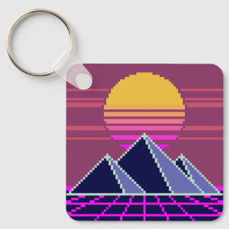 Synthwave sunset over pyramids pixel art keychain