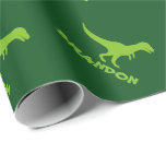 T-rex dinosaur wrapping paper and custom kids name<br><div class="desc">Cute Green trex dinosaur wrapping papter personalized with kids name. Cute prehistoric t rex gift wrap design for little boys 1st birthday party, baby shower, christmas etc. Make one for son, grandson, new baby, grandchild, new mom, mother to be, newborn child etc. Wild Pre historic t-rex animal cartoon illustration for...</div>