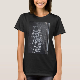 T-shirt Apprendre à un homme...