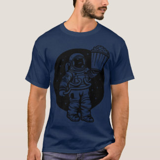 T-shirt astronaute regardant un film