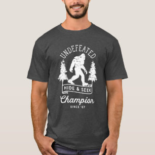 T-shirt Bigfoot non vaincu Cacher et Chercher Champion Dis