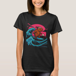 T-shirt Capyra Riding Waves Under Pink Sky Funny Summer Te