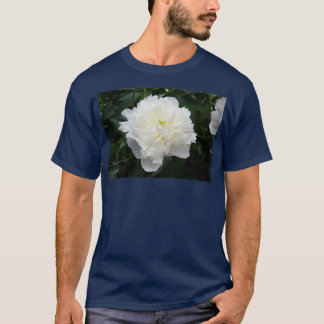 T-shirt Carnation blanche poussant dans un jardin