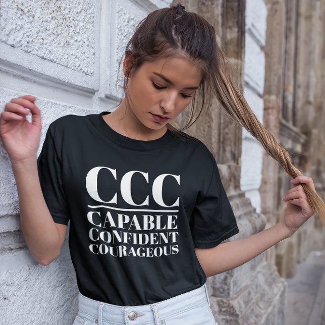 T-shirt CCC - Capable, confiant, courageux (Young woman wears a "CCC:Capable, Confident, Courageous" black t-shirt.)