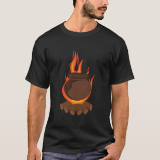 T-shirt Cooking In Clay Pot On Wooden Fire