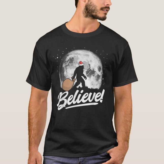 T-shirt Croyez Père Noël Bigfoot Noël Lune de neige Nuit G (Devant)