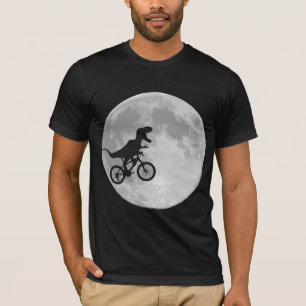 T-shirt Dinosaure sur un vélo dans le ciel avec la lune