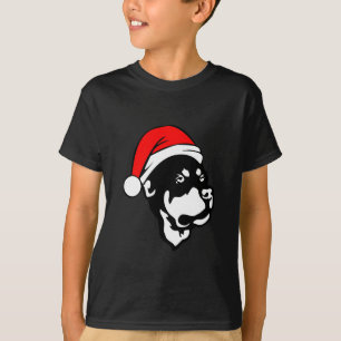 T-shirt Doigt Rottweiler portant le chapeau de Noël rouge